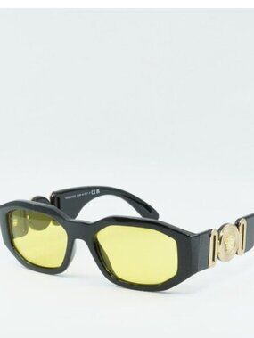 Versace VE4361 GB1/85 Sunglasses Solid Black Oval Frame, Yellow Lenses